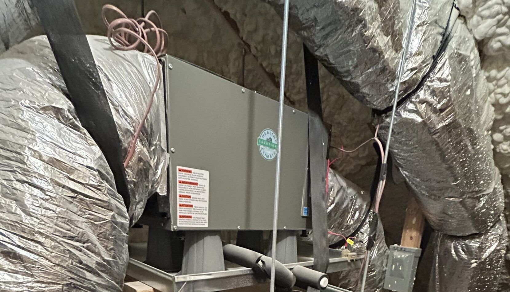 a newly installed variable capacity Lennox split heat pump on a concrete slab